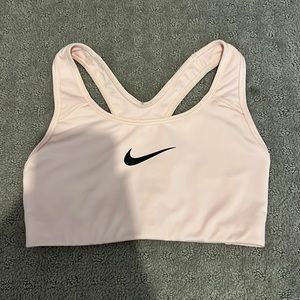 Black and pink Nike sports bra